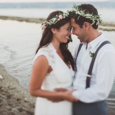 newlyweds at beach wedding ceremony in Crete