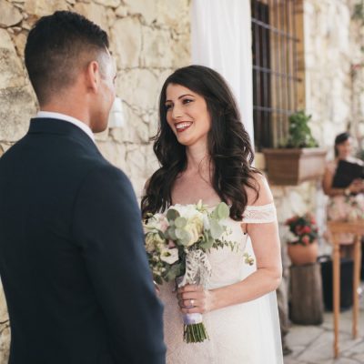 wedding ceremony at rustic winery in Crete