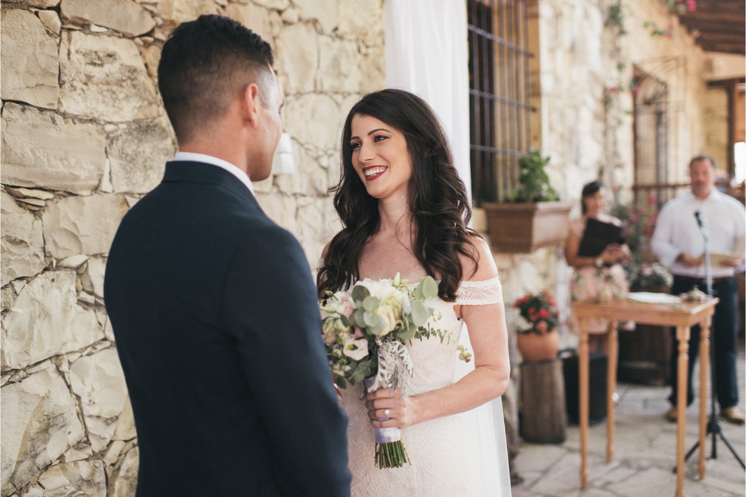 wedding ceremony at rustic winery in Crete