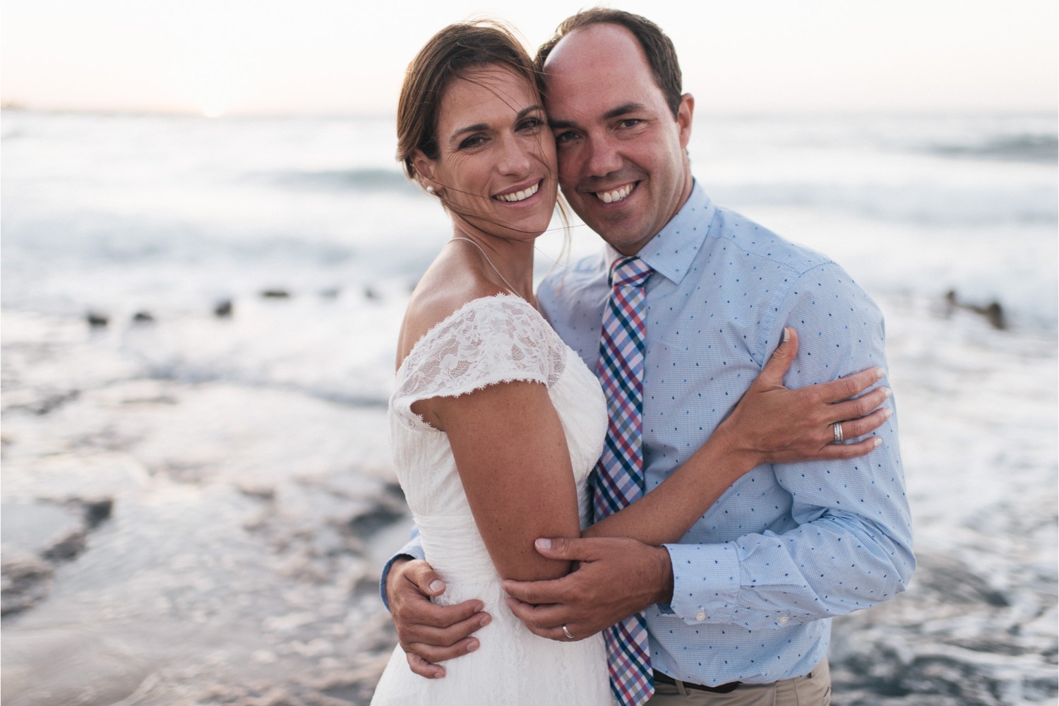 wife & husband at vow renewal on the beach in Crete