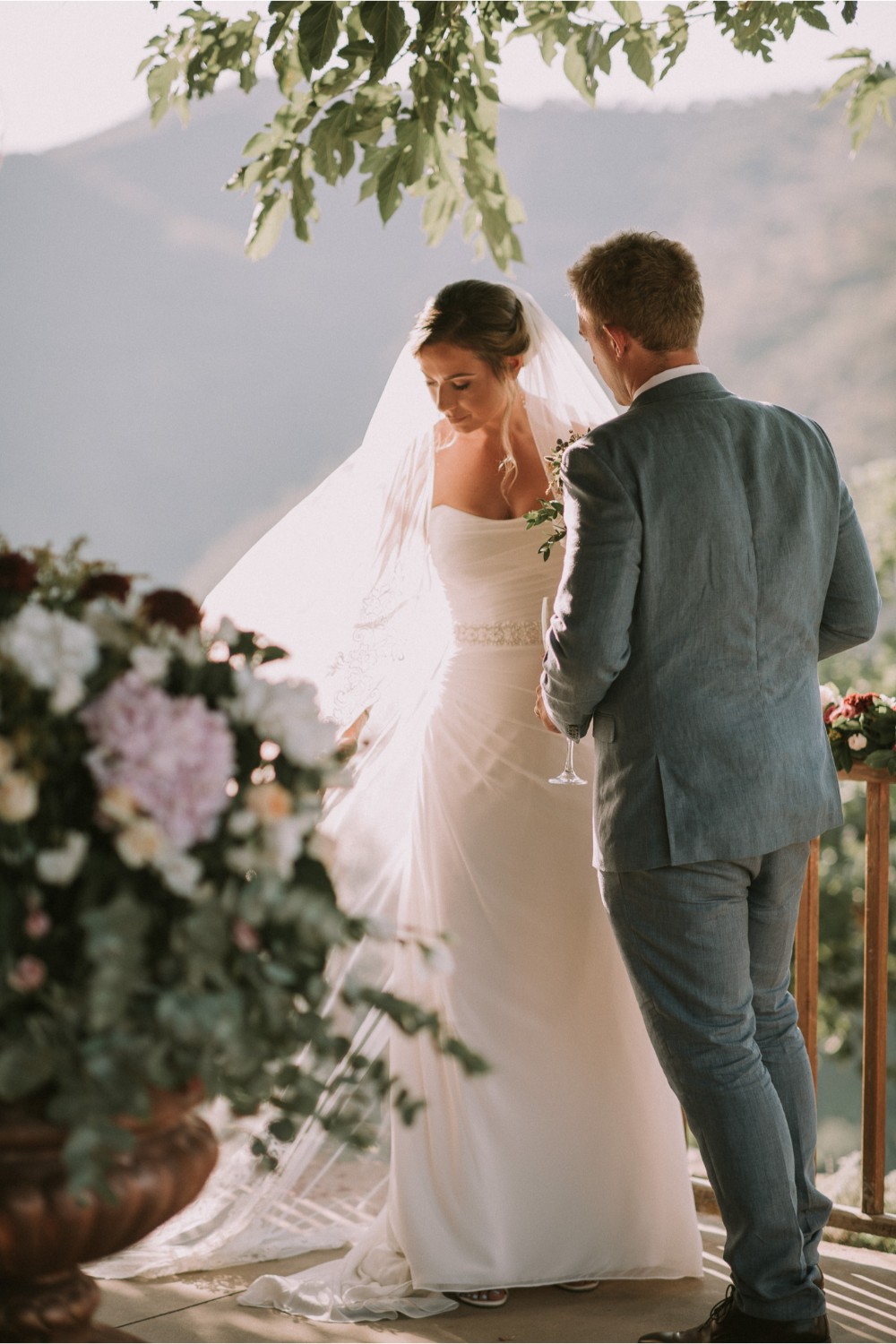 Newlyweds at wedding ceremony in botanical gardens in Crete, Greece