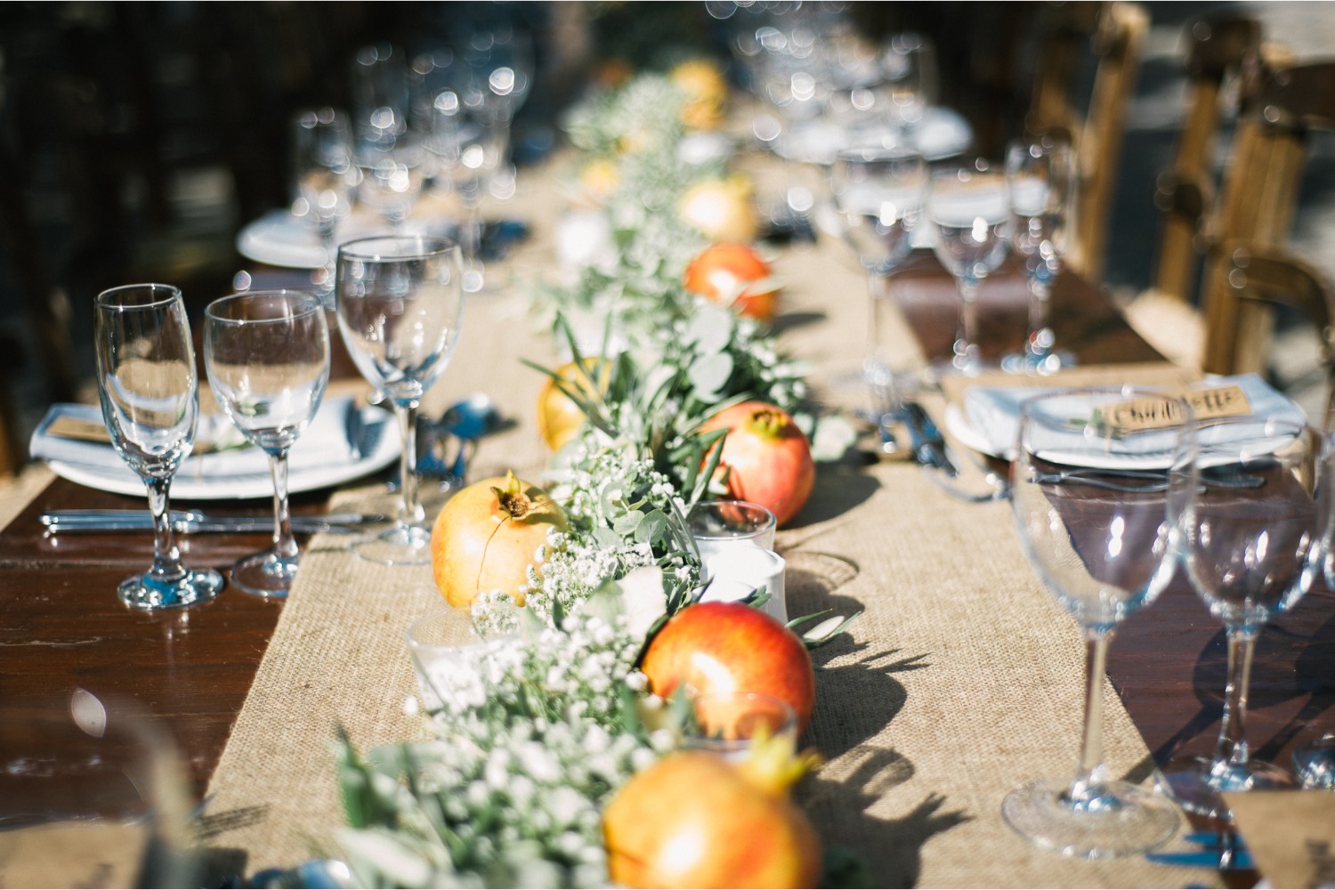 pomegranate garland at rustic estate wedding in Crete