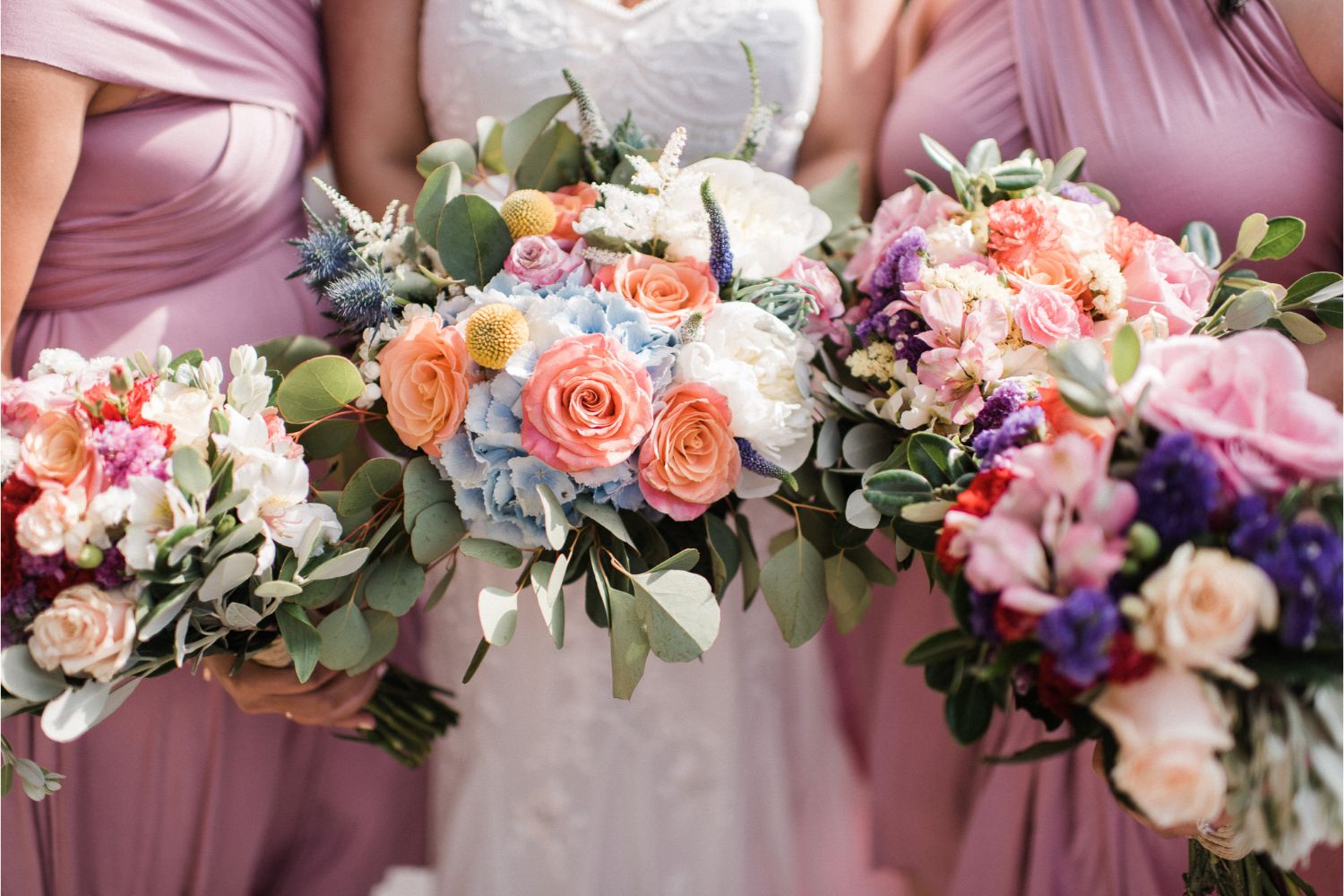 colourful spring bride & bridesmaid's bouquets