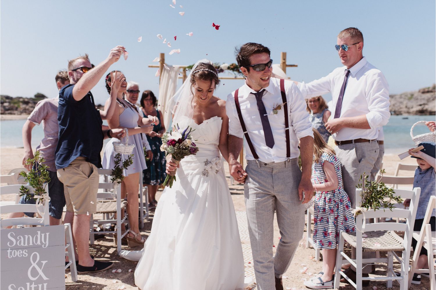 confetti moment at beach wedding ceremony in Crete