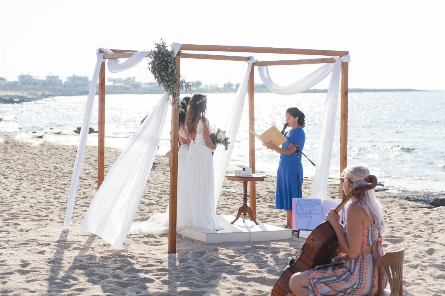 same-sex wedding ceremony on the beach