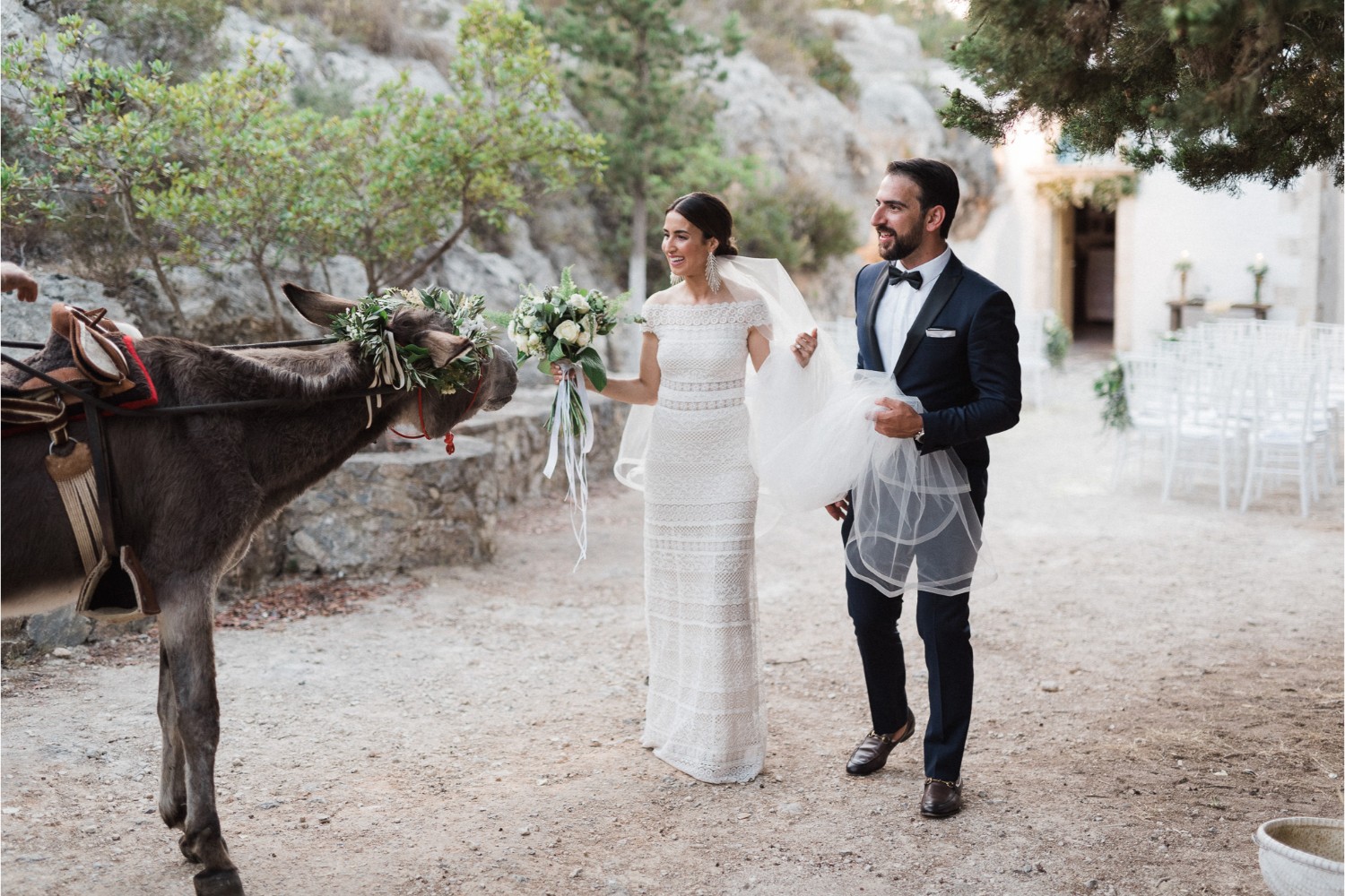 newlyweds and Greek donkey at Greek Orthodox wedding