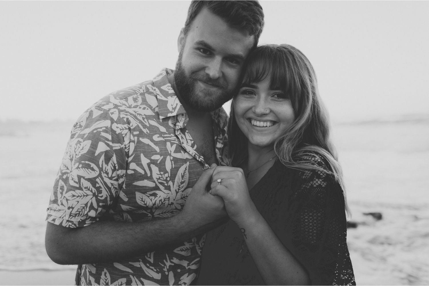 surprise proposal on the beach