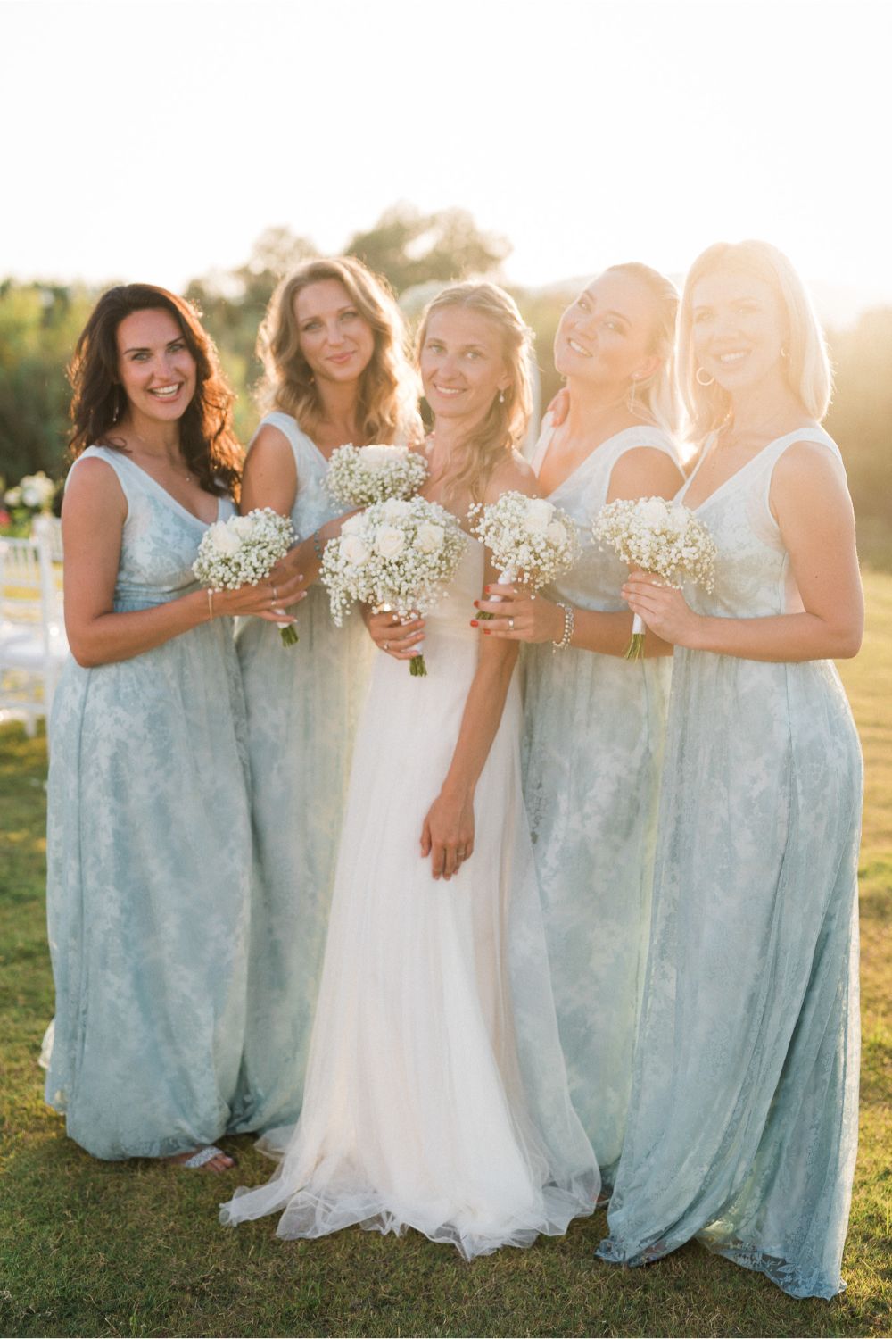 bride & bridesmaids at seaside villa wedding ceremony in Crete
