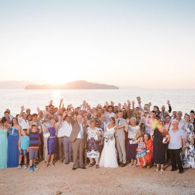 newlyweds & guests at church wedding ceremony in Crete