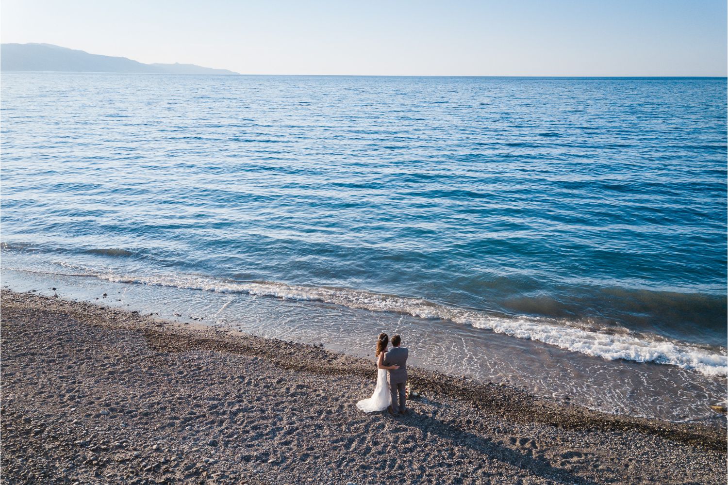 newlyweds portrait session at beach wedding in Crete