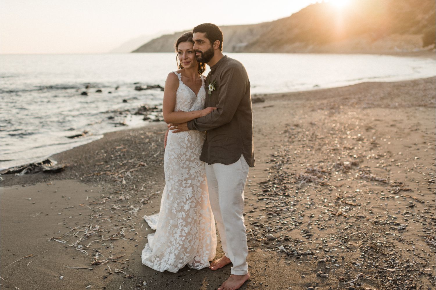 newlyweds photoshoot after beach wedding ceremony in Crete