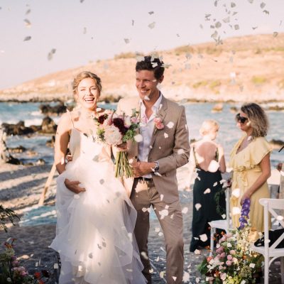 wedding recessional at seaside wedding ceremony in Crete