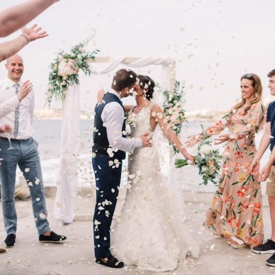 confetti moment at seaside wedding ceremony in Crete