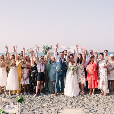 group photo at wedding ceremony on the beach in Crete