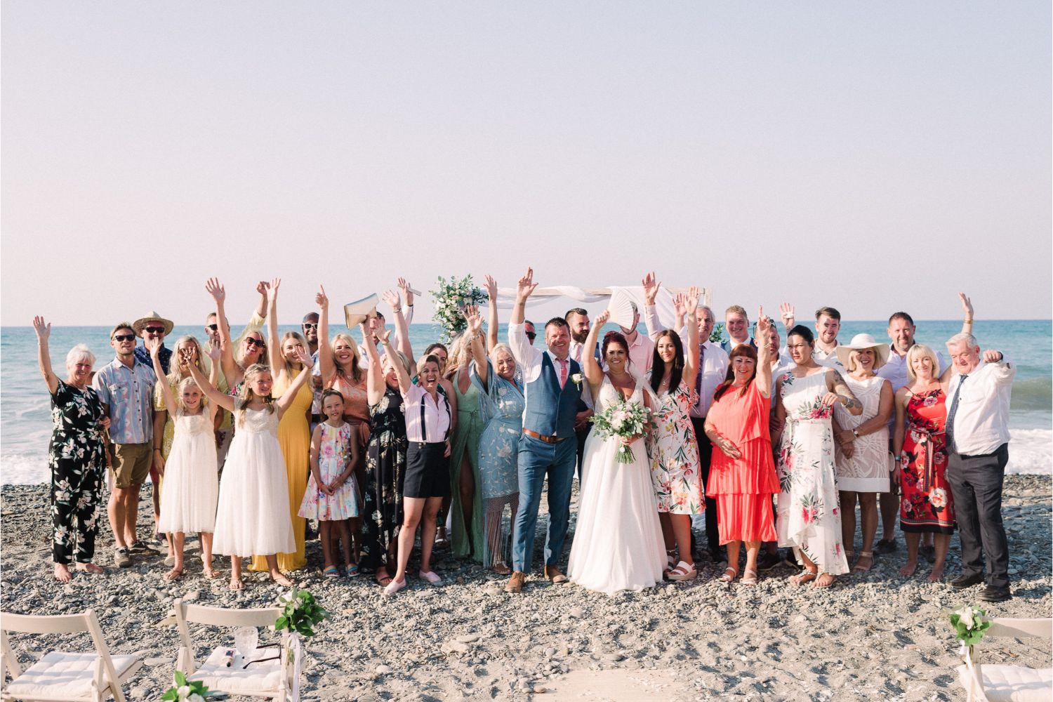 group photo at wedding ceremony on the beach in Crete