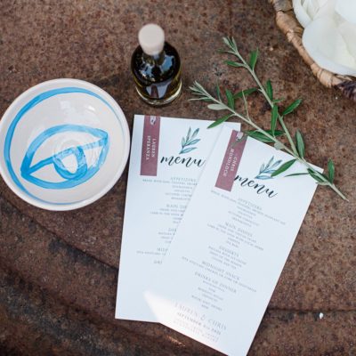 Menu design matching guests favors of olive oil and ceramic pot for the olive dips